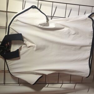 Ladies size medium, black and white golf shirt